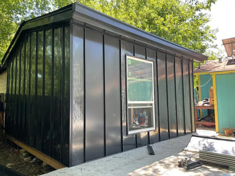 Black standing seam metal wall panels for Metal Roof Installation in Athens